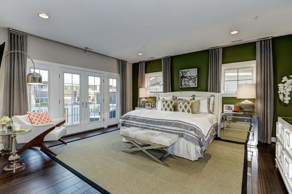 Design ideas for a classic master and grey and silver bedroom in DC Metro with green walls, dark hardwood flooring and a feature wall.