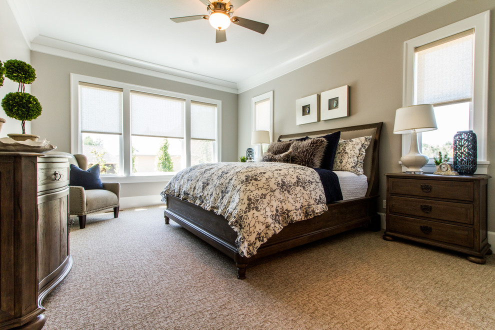 Mid-sized elegant master carpeted bedroom photo in Salt Lake City with beige walls and no fireplace