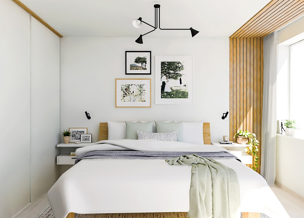 Imagen de dormitorio principal retro pequeño con paredes blancas, suelo laminado, suelo beige y panelado