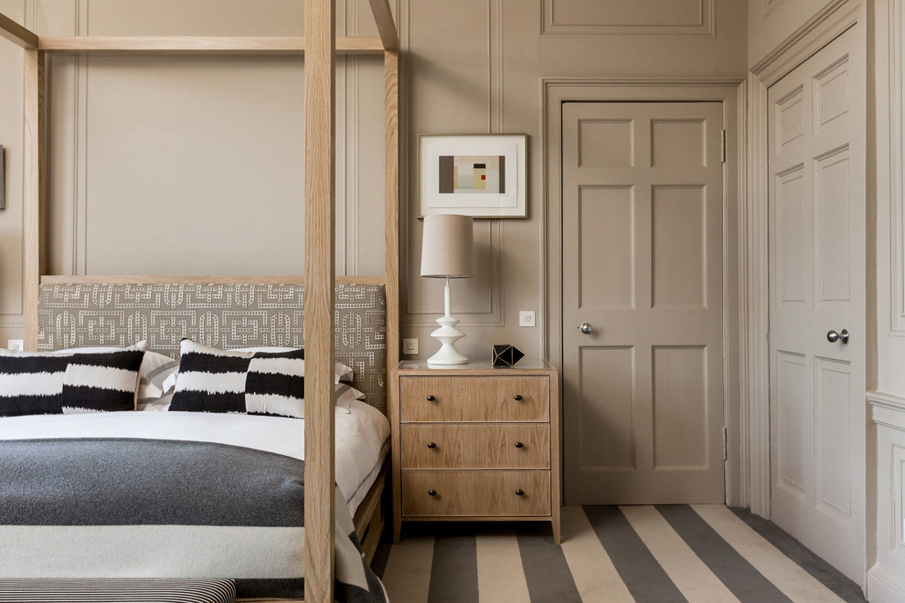 Classic master bedroom in Other with beige walls and carpet.