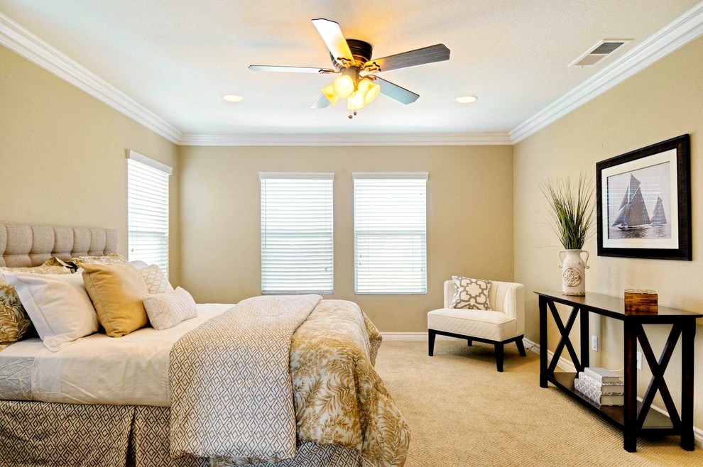 Inspiration for a large contemporary master bedroom in San Diego with white walls and carpet.