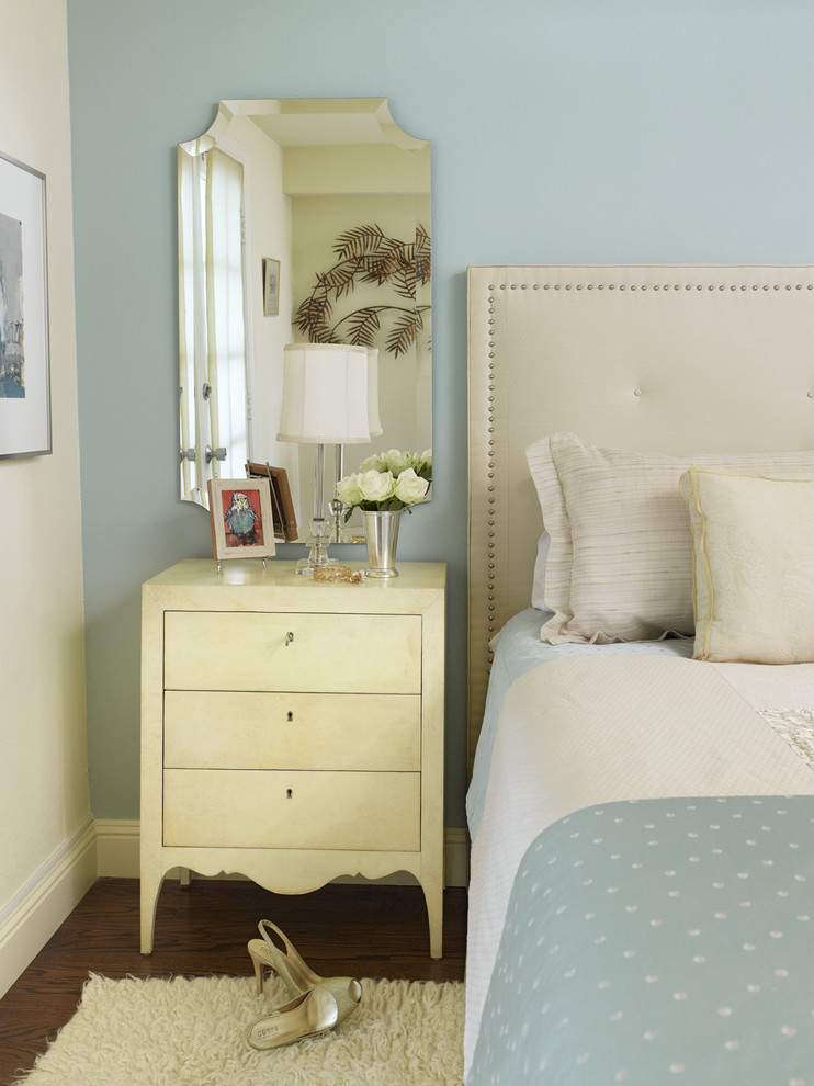 Bedroom - mid-sized shabby-chic style master medium tone wood floor bedroom idea in San Francisco with blue walls