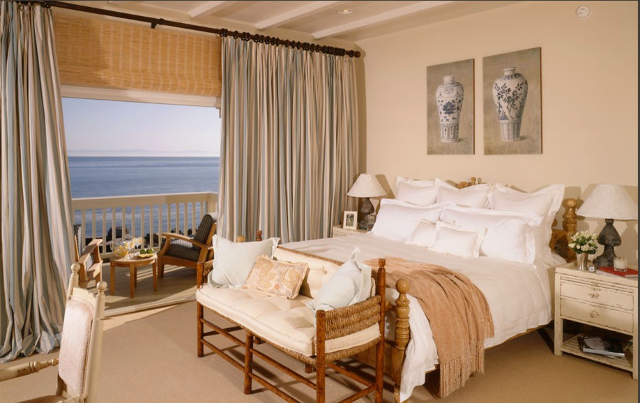 Photo of a beach style master bedroom in Santa Barbara.