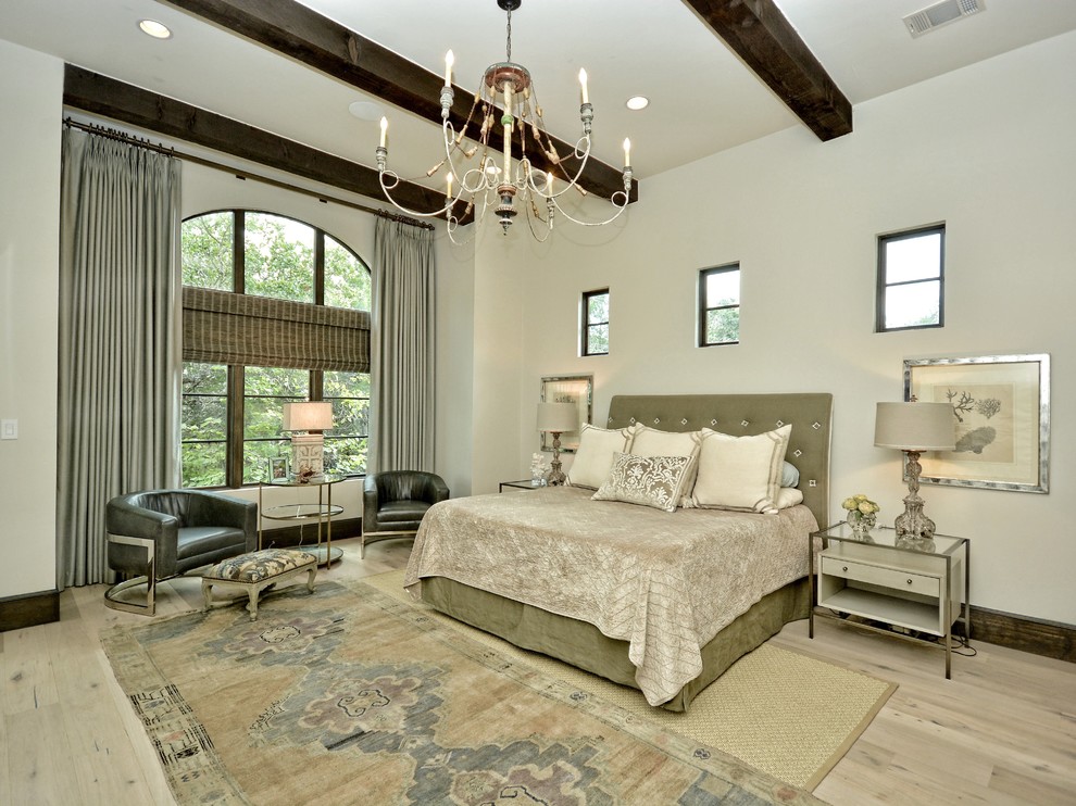 Bedroom - huge transitional master light wood floor bedroom idea in Austin with white walls and no fireplace