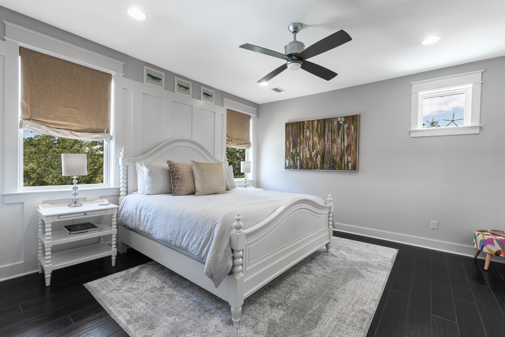 This is an example of a medium sized traditional guest and grey and brown bedroom in Miami with grey walls, dark hardwood flooring, brown floors and no fireplace.