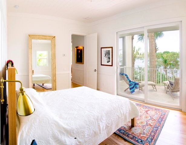 This is an example of a beach style bedroom in Tampa.