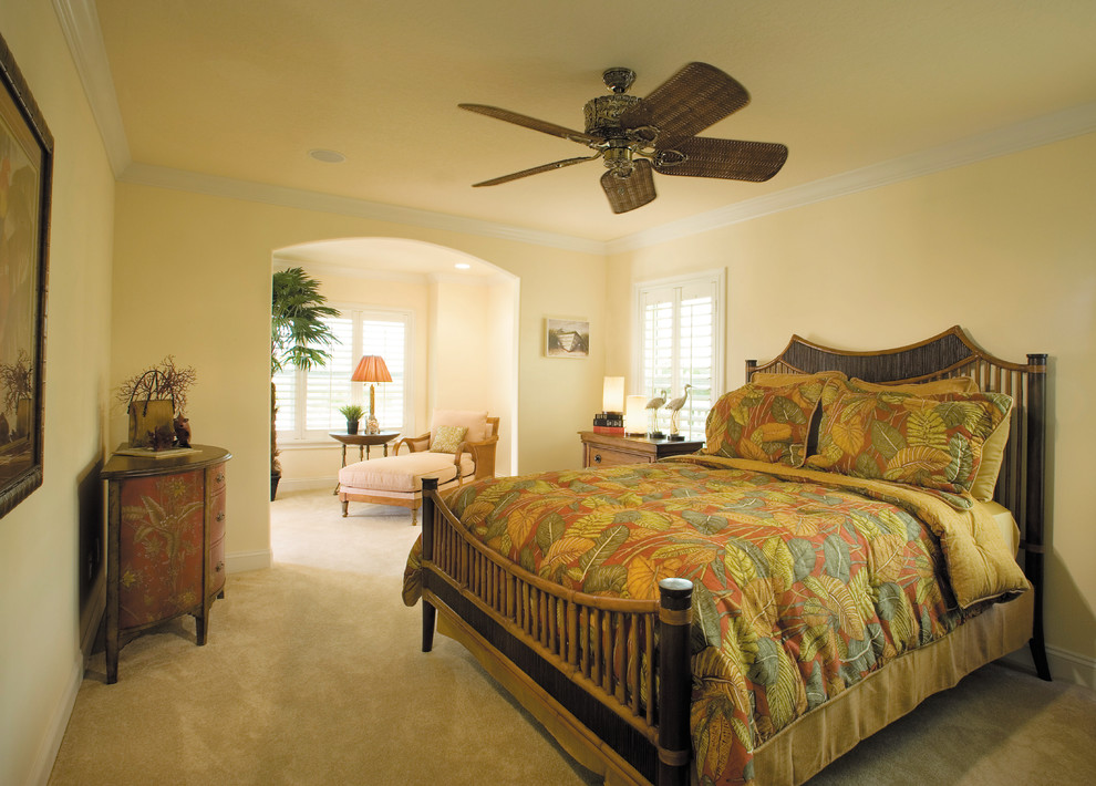 Inspiration for a large coastal guest carpeted bedroom remodel in Miami with yellow walls and no fireplace