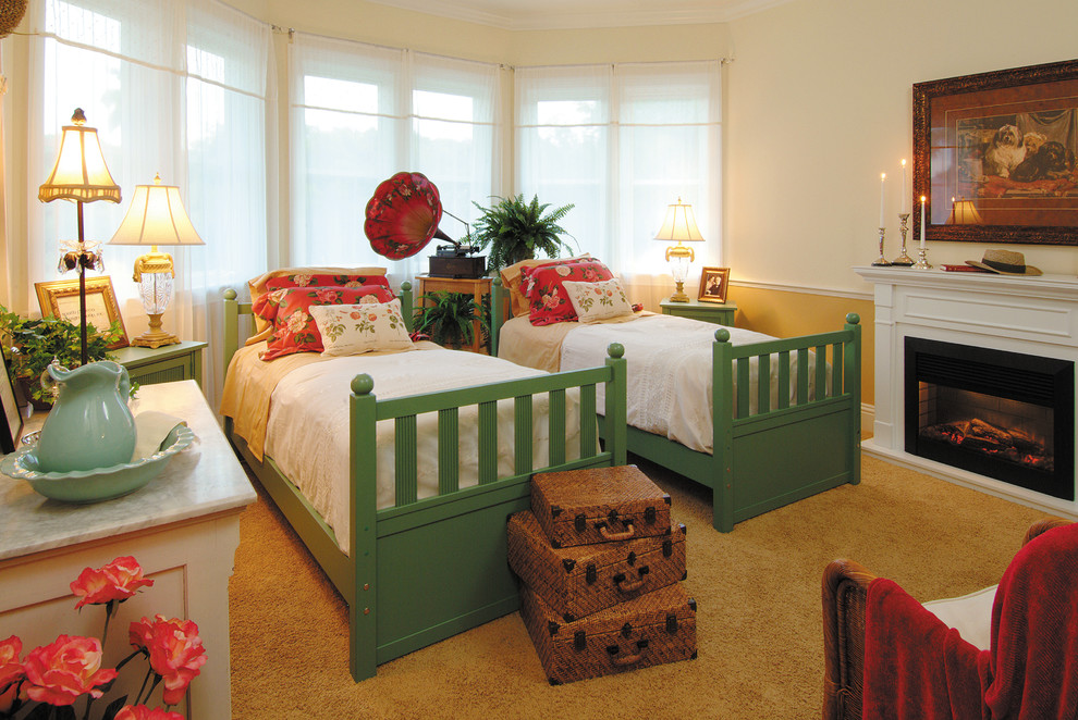 На фото: большая гостевая спальня (комната для гостей) в стиле кантри с желтыми стенами, ковровым покрытием, стандартным камином и фасадом камина из дерева с