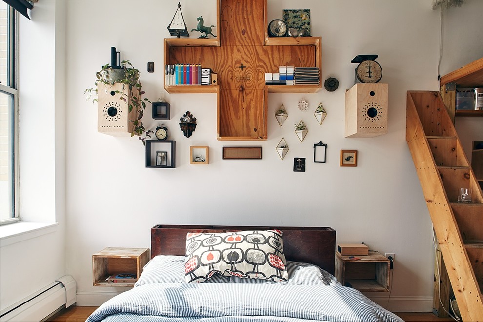 Inspiration for a scandi master bedroom in New York with white walls.