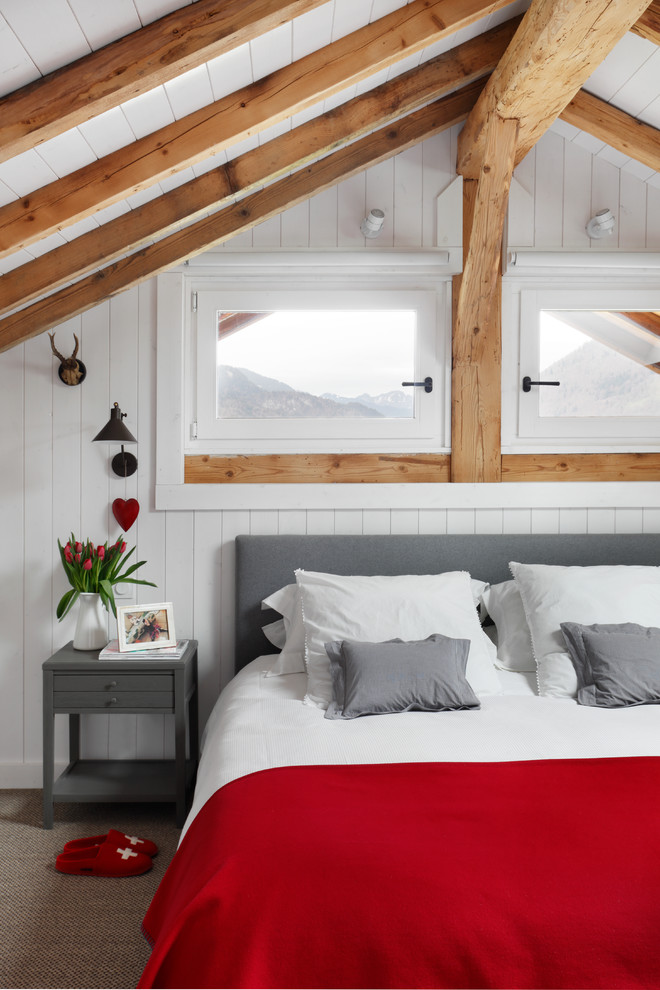 Modelo de dormitorio principal escandinavo pequeño sin chimenea con paredes blancas y moqueta