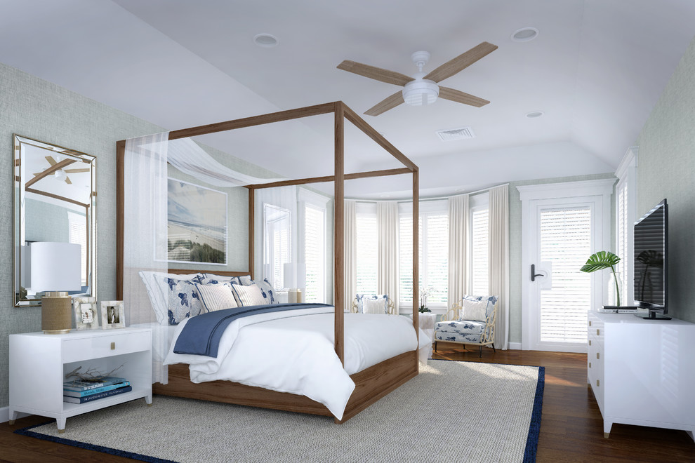Beach style master bedroom in New York with grey walls, wallpapered walls, brown floors, medium hardwood flooring and a vaulted ceiling.