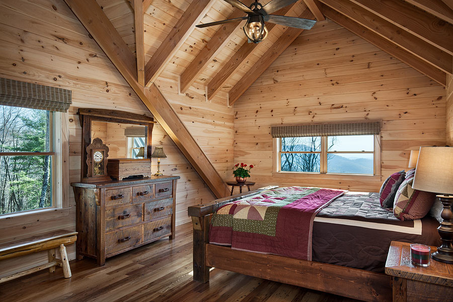 Photo of a rustic bedroom in Charlotte.