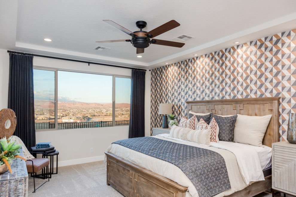 Example of a large southwest master carpeted and beige floor bedroom design in Salt Lake City with beige walls
