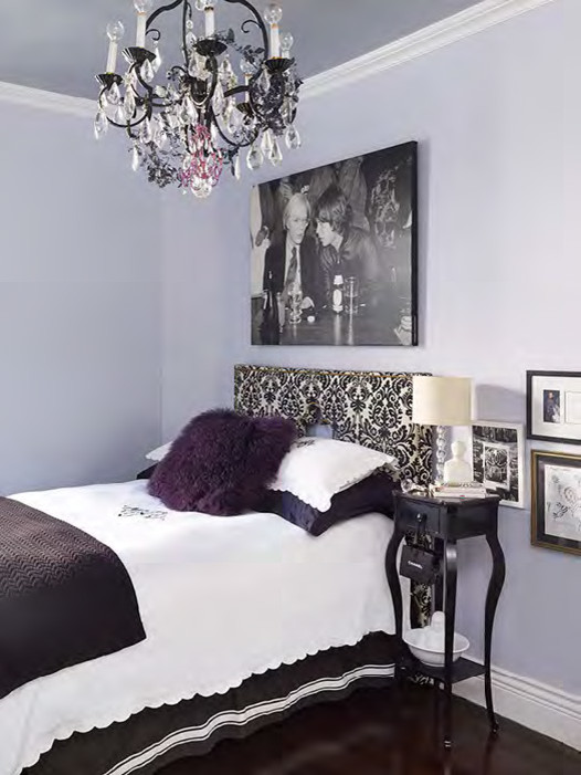Design ideas for a medium sized contemporary guest bedroom in New York with purple walls.