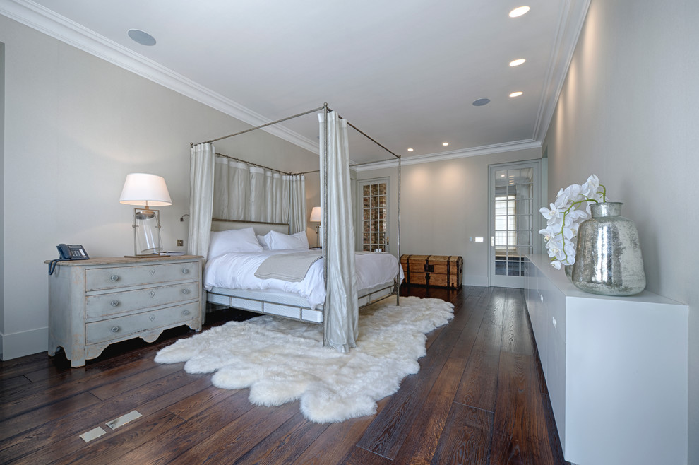 Inspiration for a large romantic master bedroom in London.