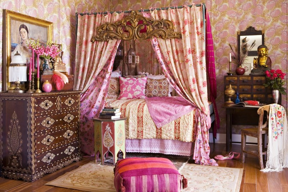 Example of a zen medium tone wood floor bedroom design in Los Angeles with multicolored walls