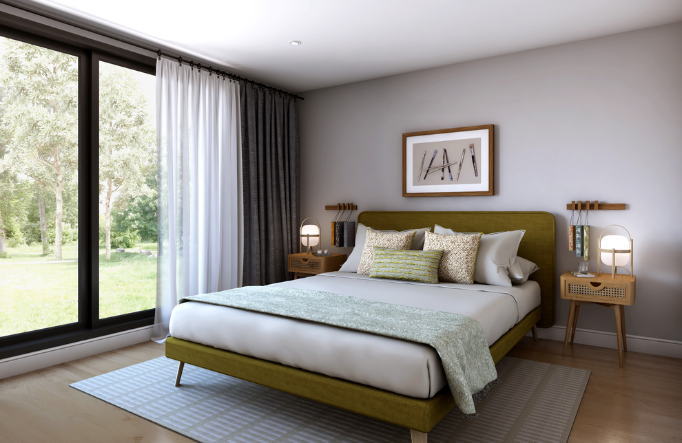 Idées déco pour une chambre d'amis moderne de taille moyenne avec un mur gris, un sol en bois brun et un sol marron.