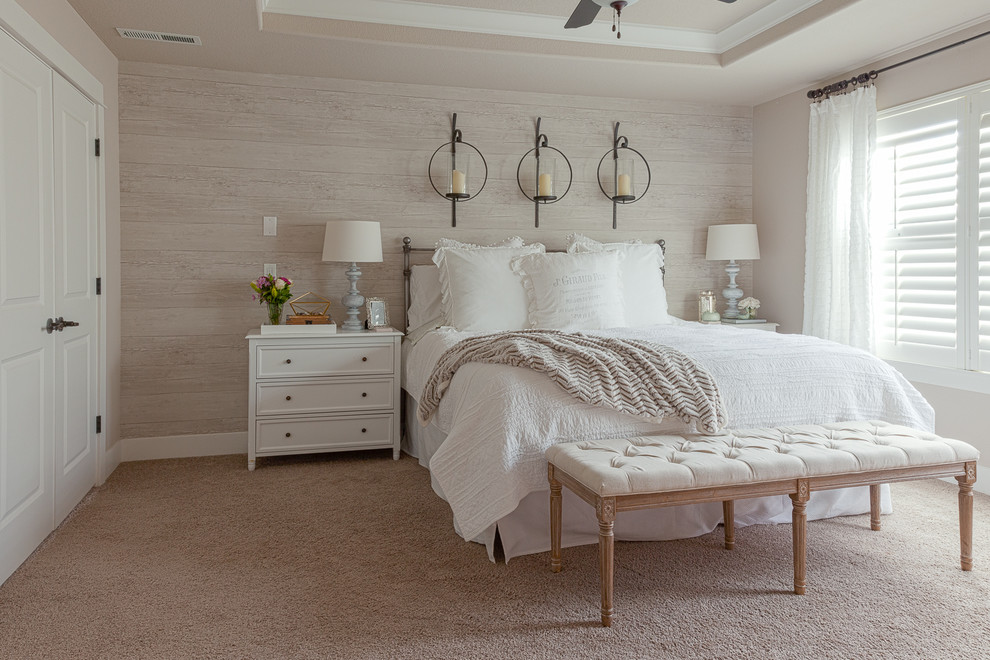 Design ideas for a medium sized vintage master bedroom in Portland with beige walls and carpet.