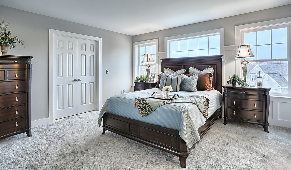 Bedroom - large transitional master carpeted and beige floor bedroom idea in Other with beige walls