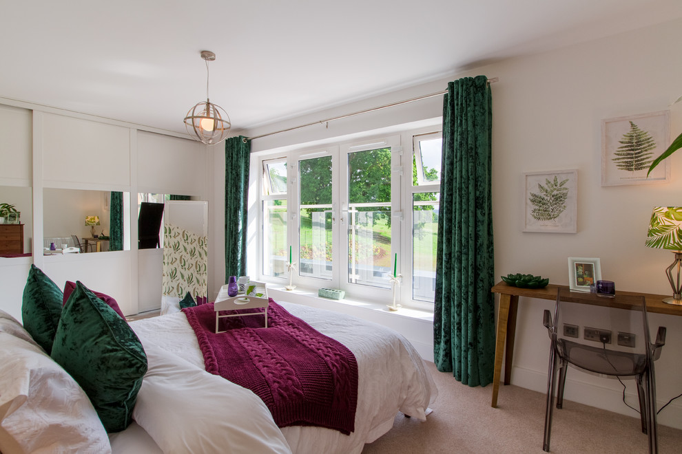 Medium sized classic bedroom in Gloucestershire with white walls, carpet and beige floors.