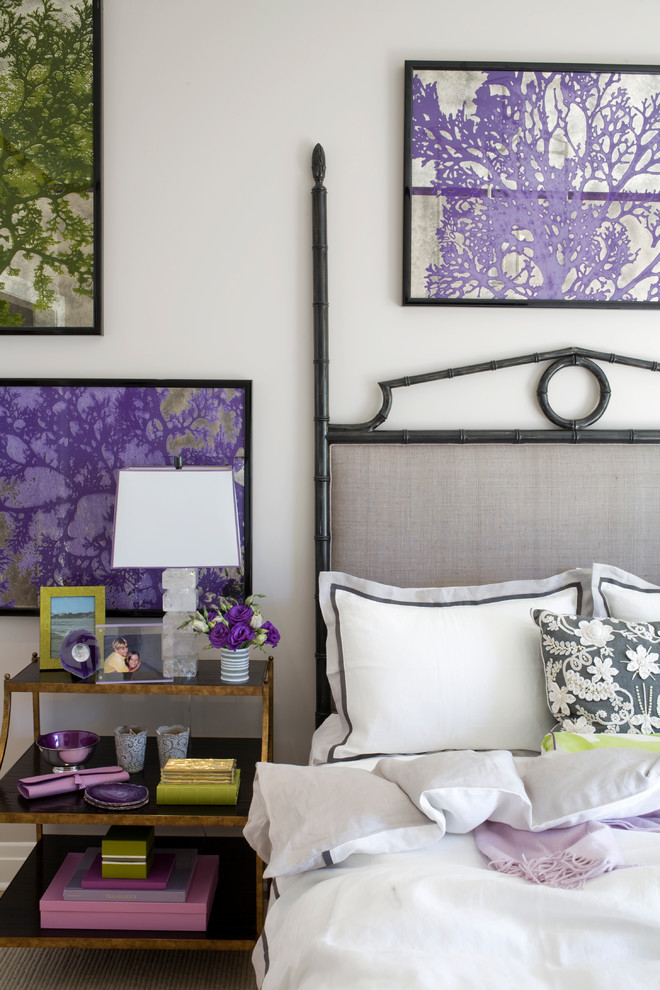 Example of an eclectic bedroom design in New York with white walls