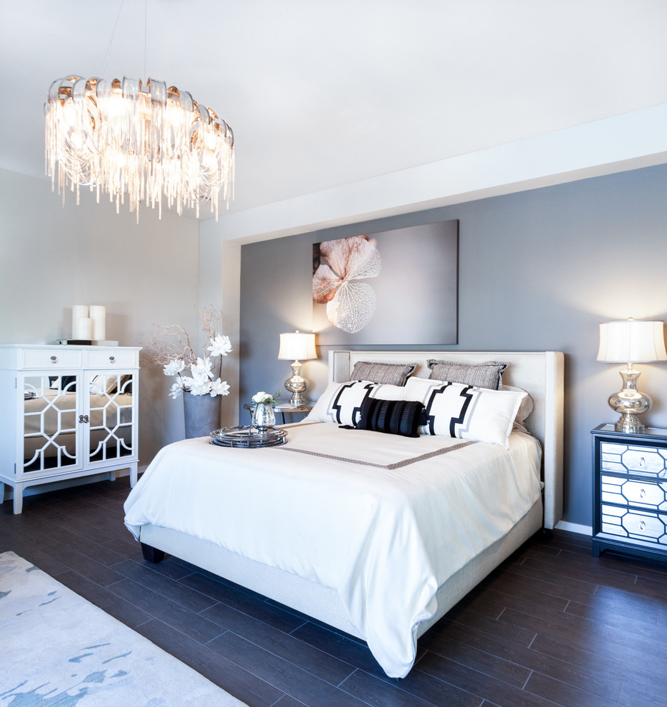 Inspiration for a large transitional master porcelain tile and brown floor bedroom remodel in Sacramento with gray walls