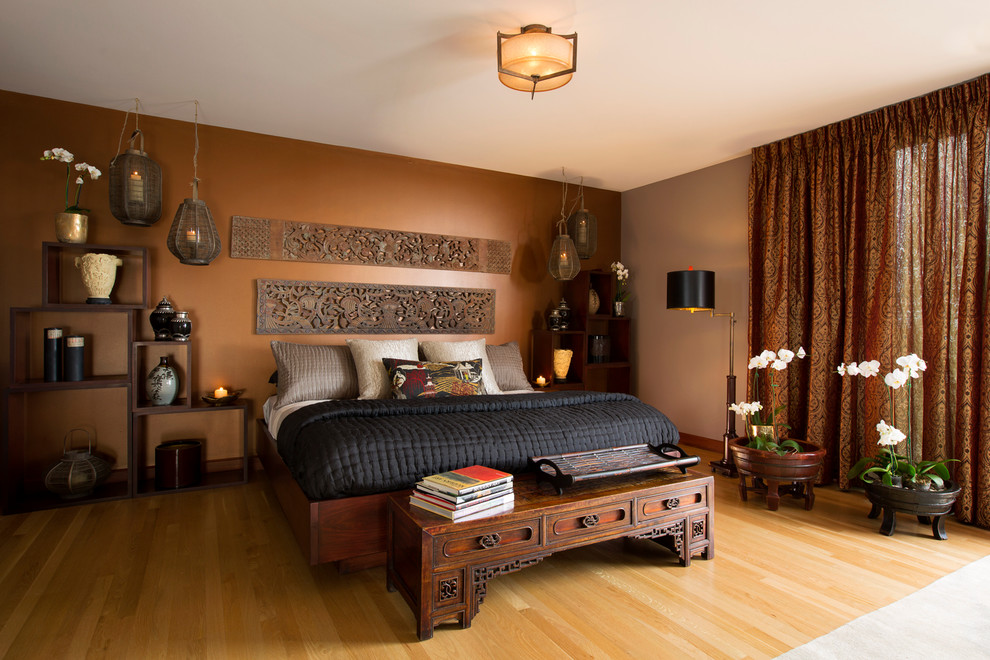 Medium sized world-inspired master bedroom in Albuquerque.