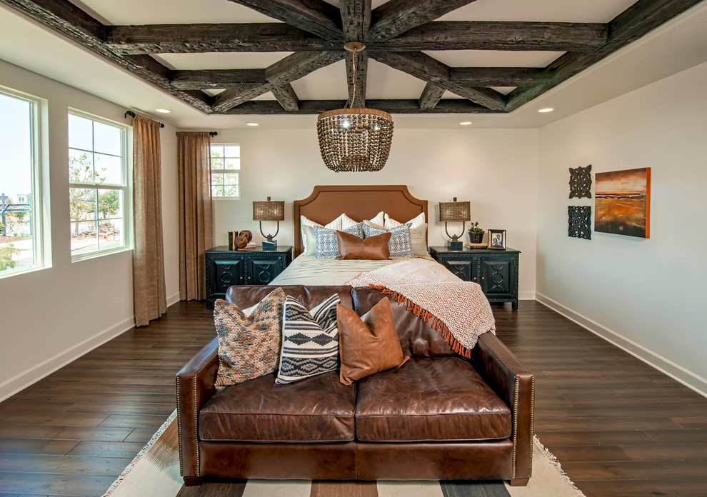 Design ideas for a bedroom in Orange County with white walls and dark hardwood flooring.
