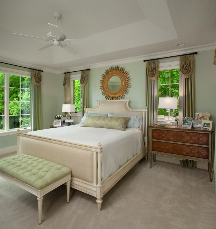 Inspiration for a huge timeless master carpeted and beige floor bedroom remodel in Grand Rapids with green walls