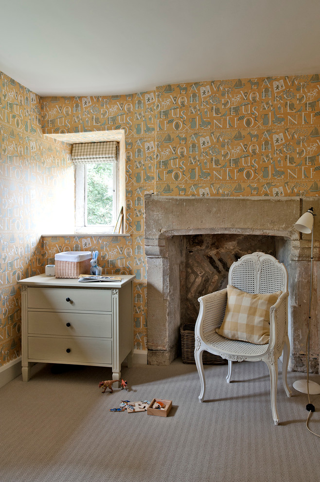 На фото: спальня среднего размера в стиле кантри с желтыми стенами, ковровым покрытием, стандартным камином и фасадом камина из камня