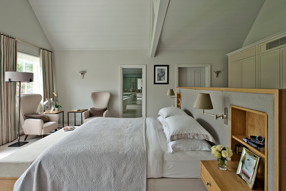 Inspiration for a large contemporary master carpeted bedroom remodel in Gloucestershire with white walls