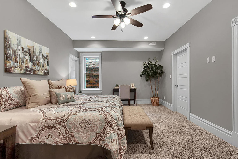 Inspiration for a mid-sized transitional master carpeted and gray floor bedroom remodel in St Louis with gray walls and no fireplace