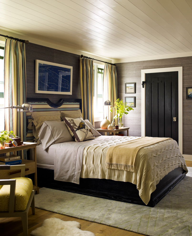 Photo of a nautical bedroom in New York with grey walls.