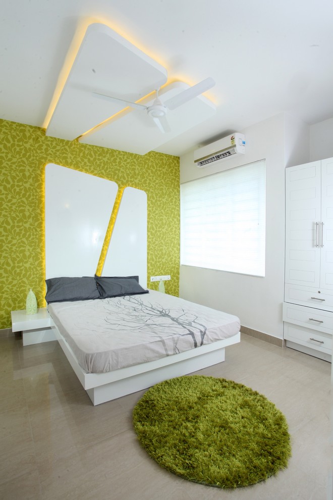 Inspiration pour une chambre design avec un mur vert.