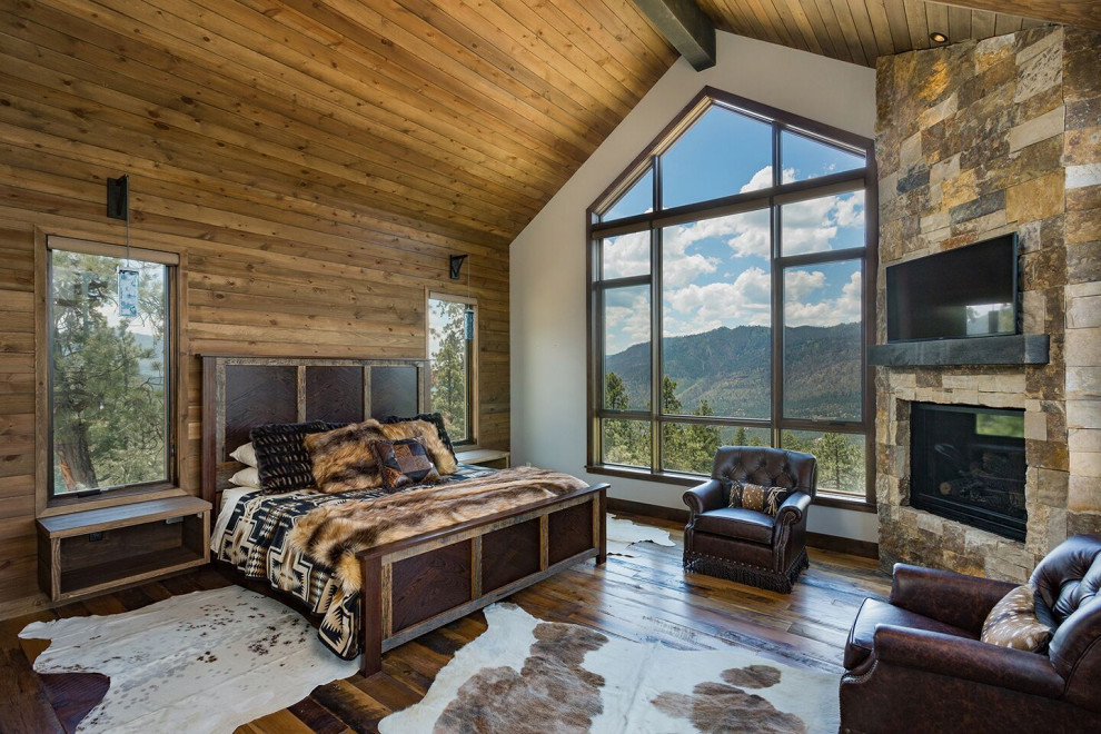 Example of a mountain style bedroom design in Denver