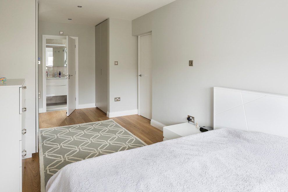 This is an example of a contemporary bedroom in Essex.