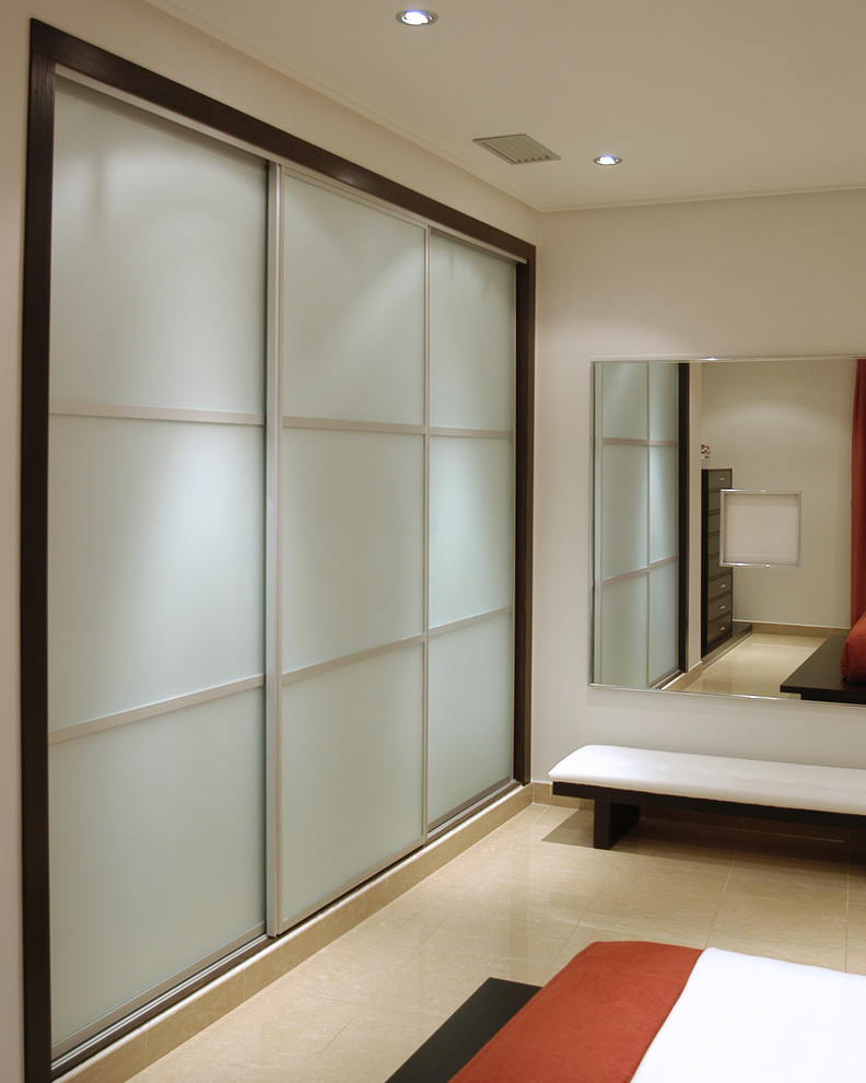 Sliding doors Contemporary Bedroom Miami by Metro Renovation