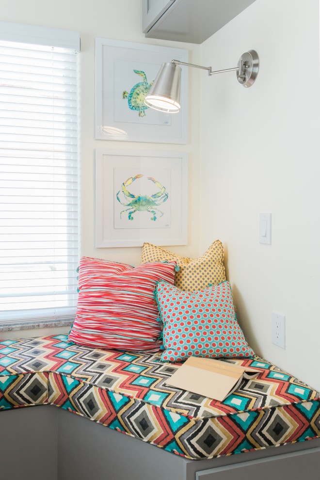 Small beach style guest vinyl floor and brown floor bedroom photo in San Diego with yellow walls
