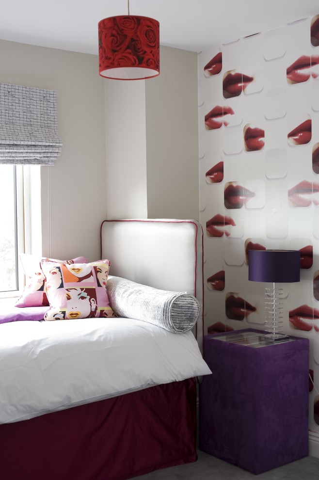 Inspiration for a modern bedroom in Dublin with beige walls and a feature wall.