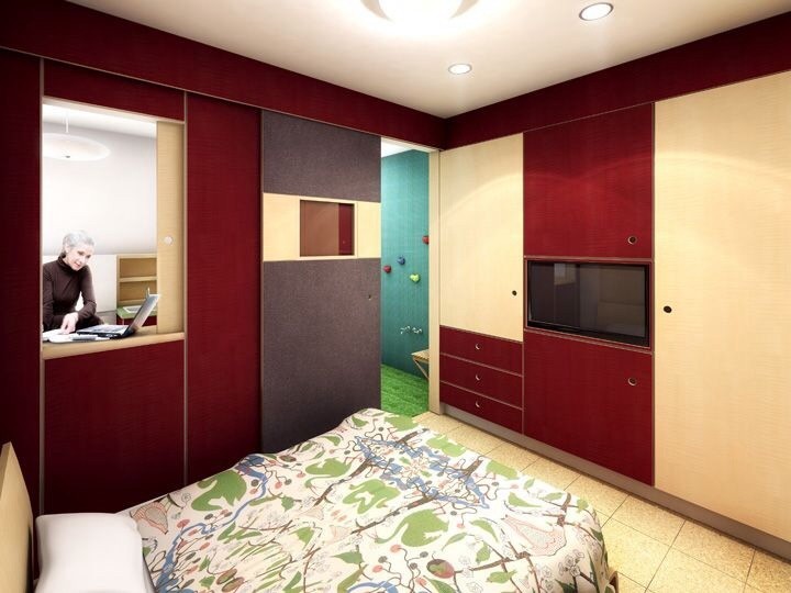 Foto de habitación de invitados actual pequeña con paredes rojas y suelo de corcho