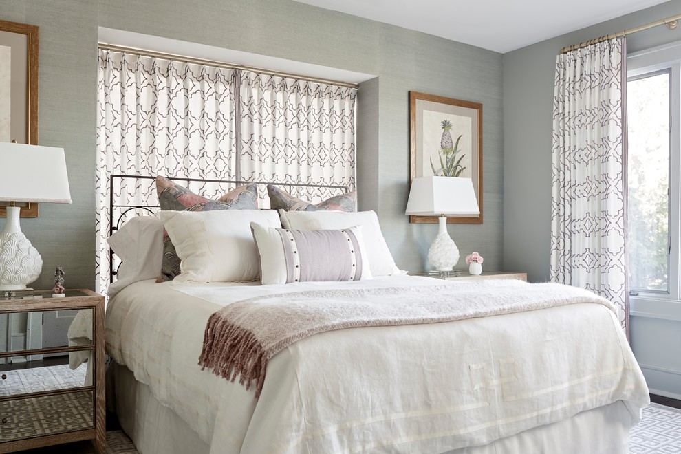 This is an example of a traditional master bedroom in Chicago with grey walls and no fireplace.