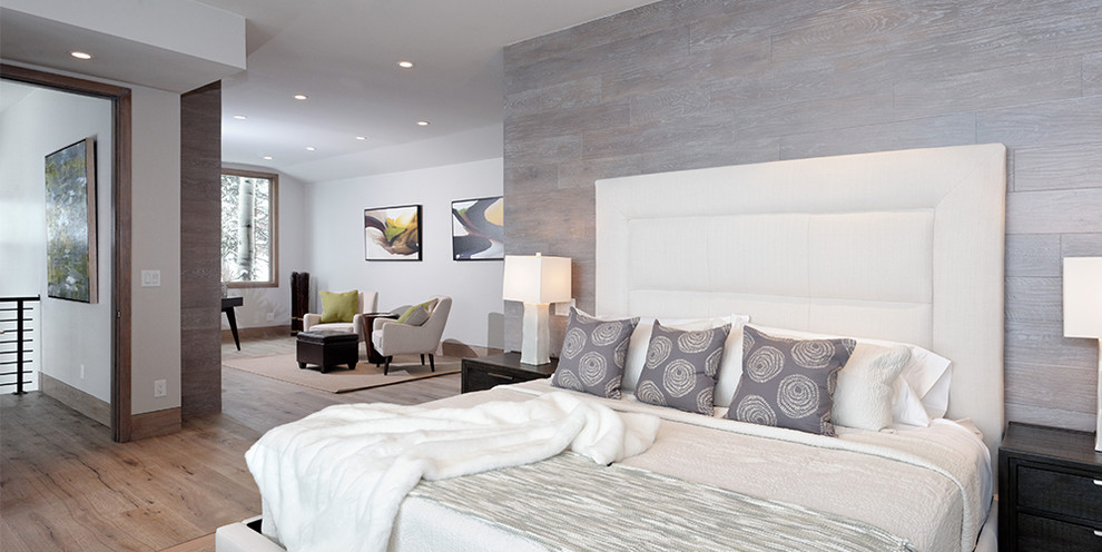 Bedroom - mid-sized modern master light wood floor bedroom idea in Denver with gray walls