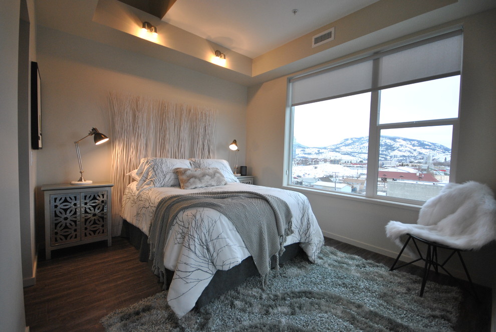 Design ideas for a small modern bedroom in Vancouver with grey walls and vinyl flooring.