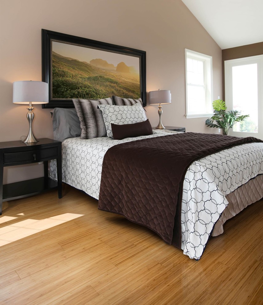 This is an example of a large contemporary bedroom in Other with beige walls and bamboo flooring.