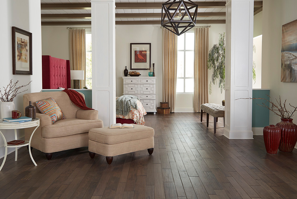 Inspiration for a large timeless master dark wood floor and brown floor bedroom remodel in Raleigh with white walls