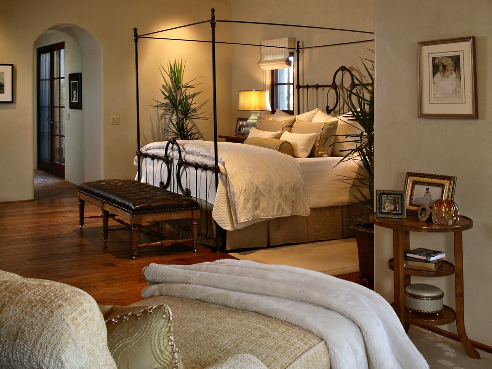 Inspiration for a large transitional master dark wood floor bedroom remodel in Phoenix with beige walls