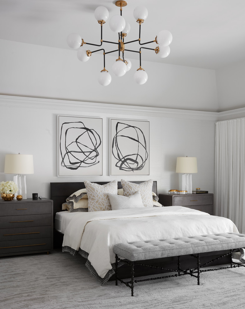 This is an example of a contemporary master bedroom in Chicago with white walls, carpet, grey floors and feature lighting.