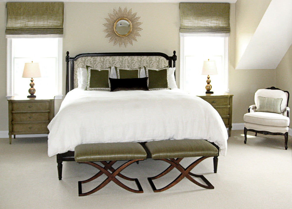 Photo of a large traditional master bedroom in Charlotte.