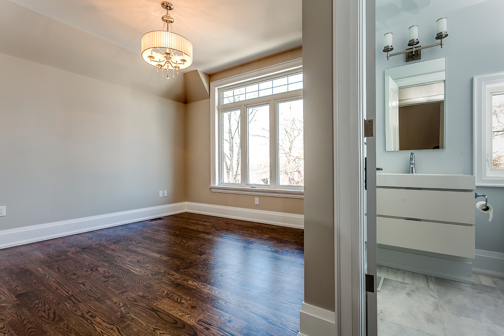 Photo of a classic guest bedroom in Toronto with medium hardwood flooring.