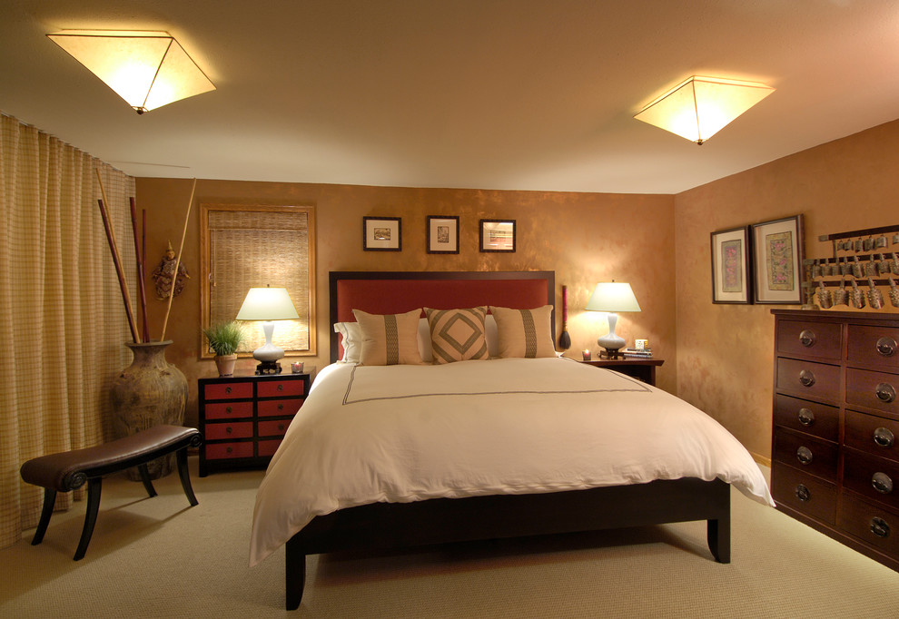 Example of a zen bedroom design in Denver
